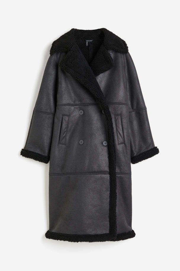 H&M Zweireihiger Mantel mit Teddyfutter Schwarz