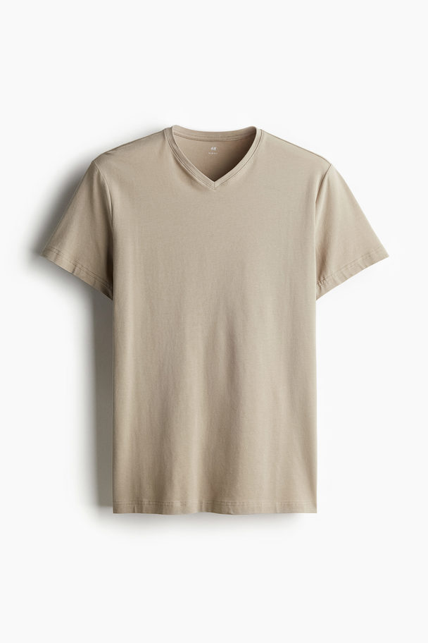 H&M 5er-Pack T-Shirts mit V-Ausschnitt in Slim Fit Weiß/Beige/Marineblau