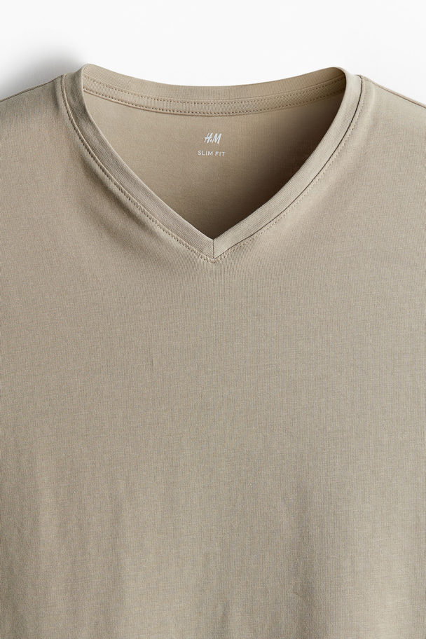 H&M 5er-Pack T-Shirts mit V-Ausschnitt in Slim Fit Weiß/Beige/Marineblau