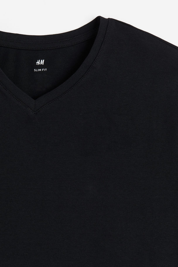 H&M 5er-Pack T-Shirts mit V-Ausschnitt in Slim Fit Schwarz/Weiß