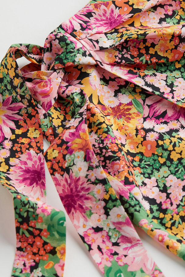 H&M Patterned Lyocell-blend Wrapover Skirt Black/floral