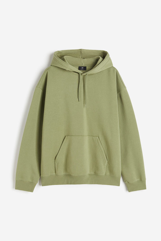 H&M Hoodie in Loose Fit Grün