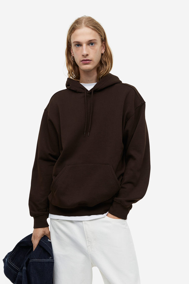 H&M Capuchonsweater - Loose Fit Donkerbruin