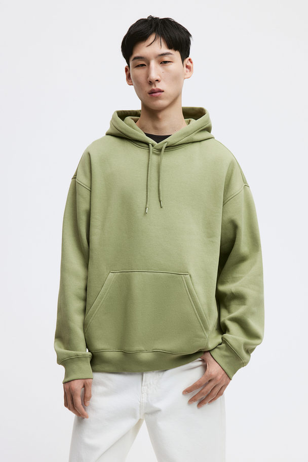 H&M Hoodie in Loose Fit Grün