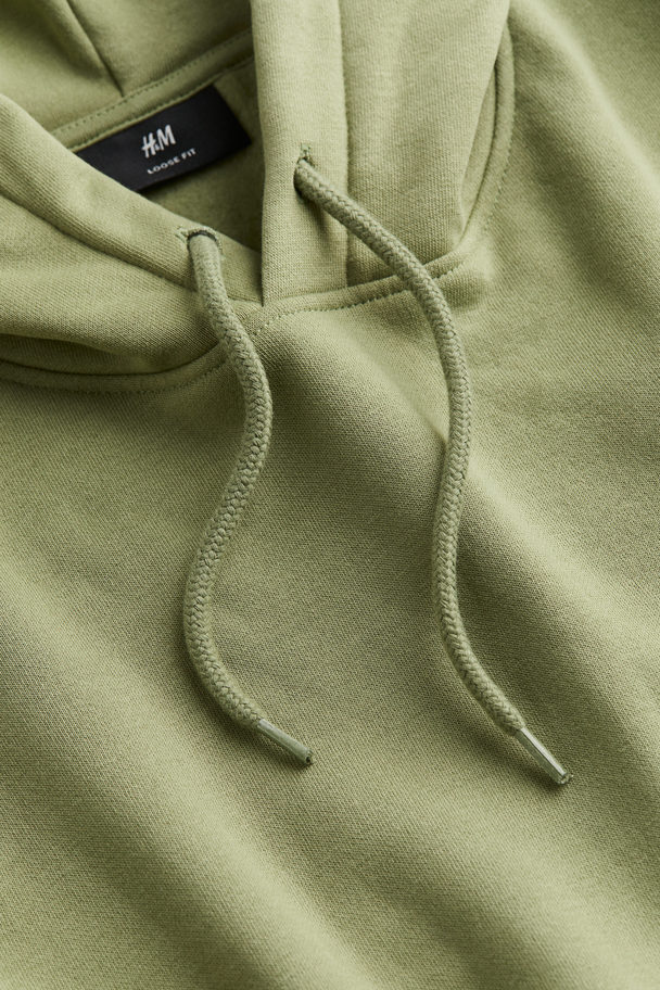 H&M Hoodie in Loose Fit Grün