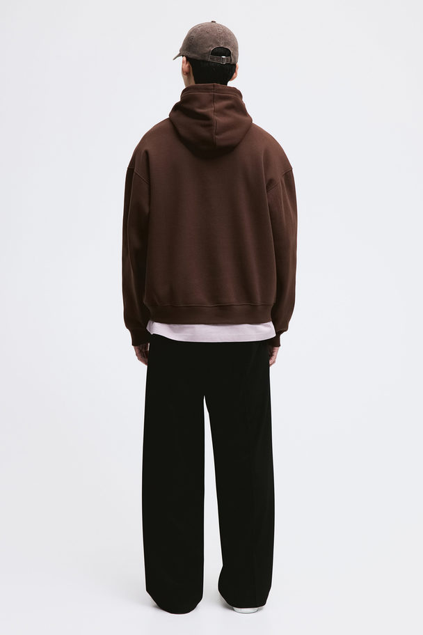 H&M Capuchonsweater - Loose Fit Bruin