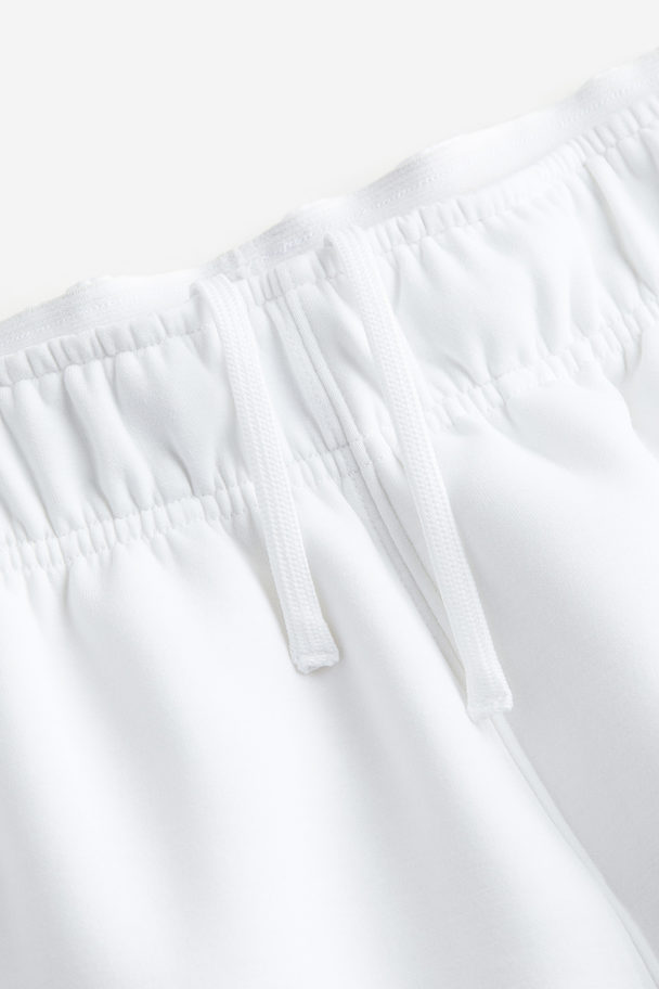 H&M DryMove™ Sportshorts Weiß