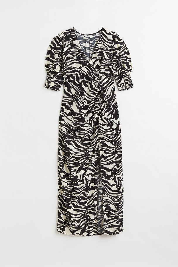 H&M Crêpe-Kleid mit Puffärmeln Schwarz/Zebramuster
