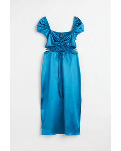 Glänzendes Kleid mit Cut-out Blau