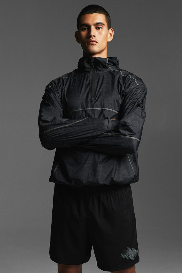 H&M DryMove™ Sportshorts aus Webstoff mit Taschen Schwarz