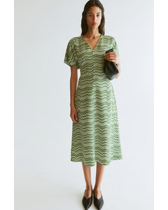 Kleid mit V-Ausschnitt Grün/Gemustert