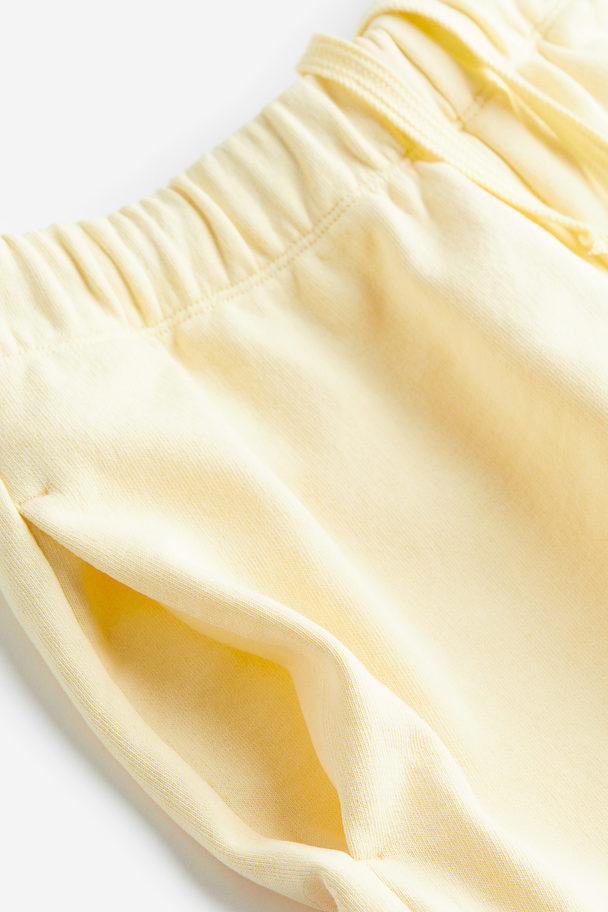 H&M Drymove™ Jersey Sports Shorts Light Yellow