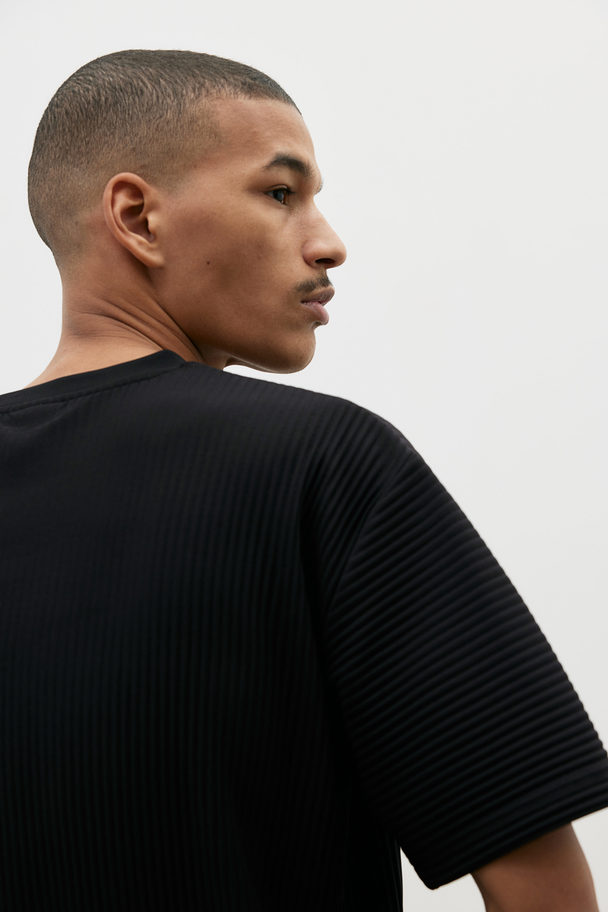 H&M Geplisseerd T-shirt - Loose Fit Zwart