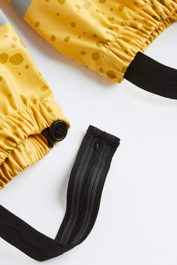 H&M Regenhose mit Trägern Gelb/Gepunktet