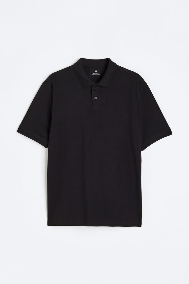 H&M Poloshirt aus Baumwolle Regular Fit Schwarz