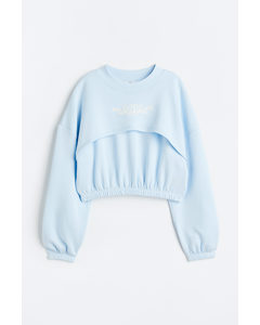 Boxy Sweater Lichtblauw/love