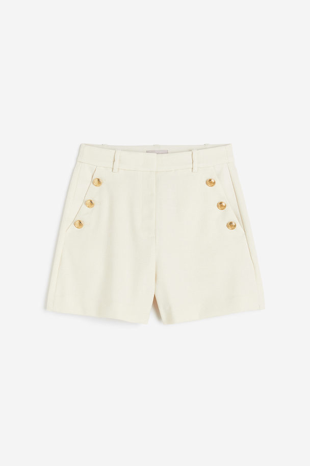 H&M Shorts mit Zierknöpfen Cremefarben