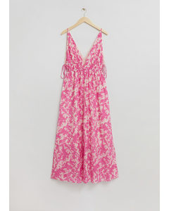 Kleid mit V-Ausschnitt und Bindedetails Rosa/Weiß gemustert