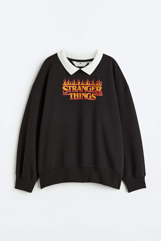 H&M Oversized Sweatshirt Schwarz/Stranger Things