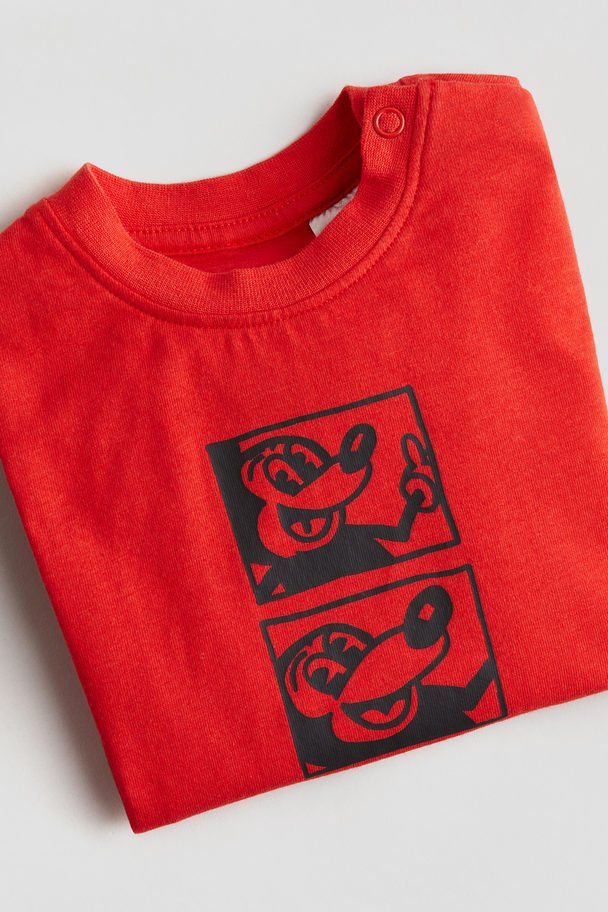 H&M Baumwoll-T-Shirt mit Motivdetail Rot