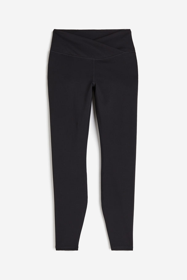 H&M DryMove™ Sportleggings mit überlappendem Bund Schwarz