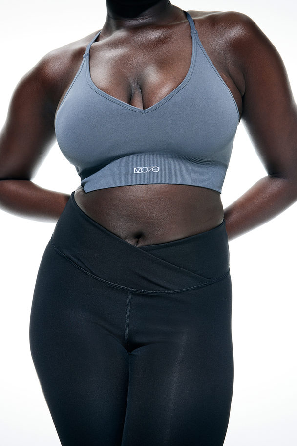 H&M DryMove™ Sportleggings mit überlappendem Bund Schwarz