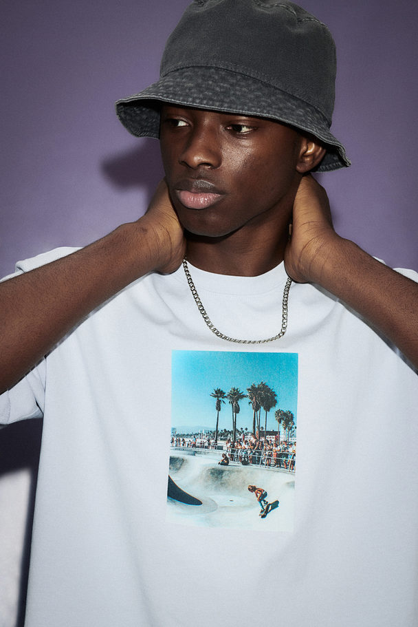 H&M Loose Fit Printed T-shirt Light Blue/skateboarder