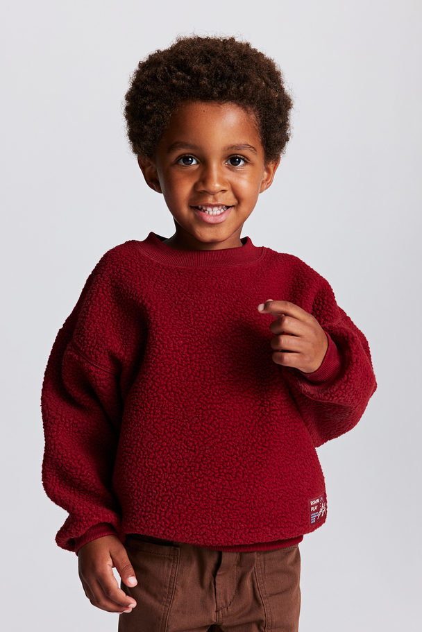H&M Sweatshirt aus Teddyfleece in Oversized Dunkelrot