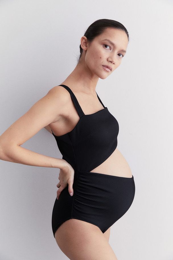 H&M MAMA Badeanzug mit Cut-out und wattierten Cups Schwarz