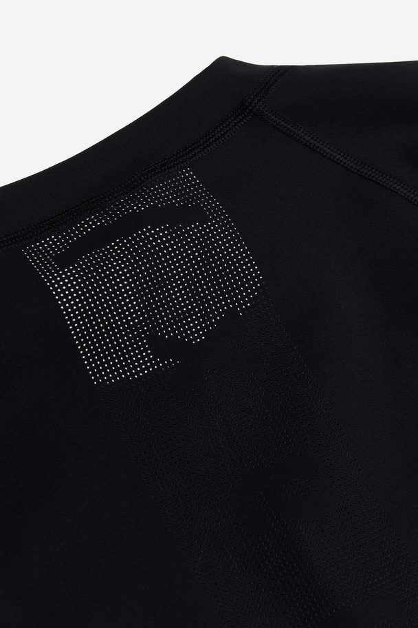 H&M DryMove™ Sport-T-Shirt mit Print Schwarz