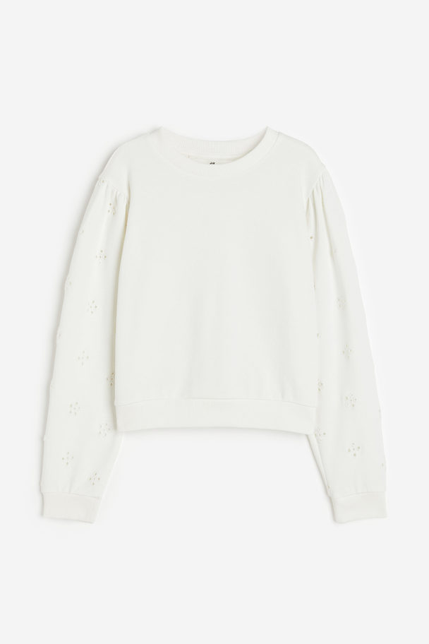 H&M Sweatshirt mit Broderie Anglaise Weiß