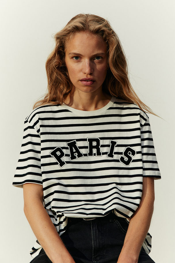 H&M T-Shirt mit Print Schwarz gestreift/Paris