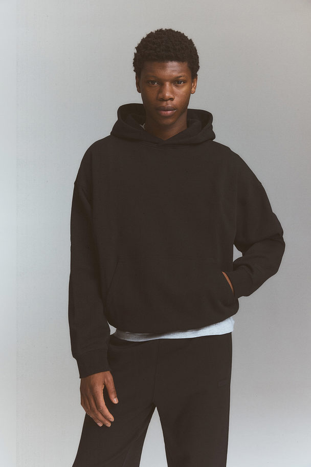 H&M Sportsweater Van Drymove™ - Loose Fit Zwart