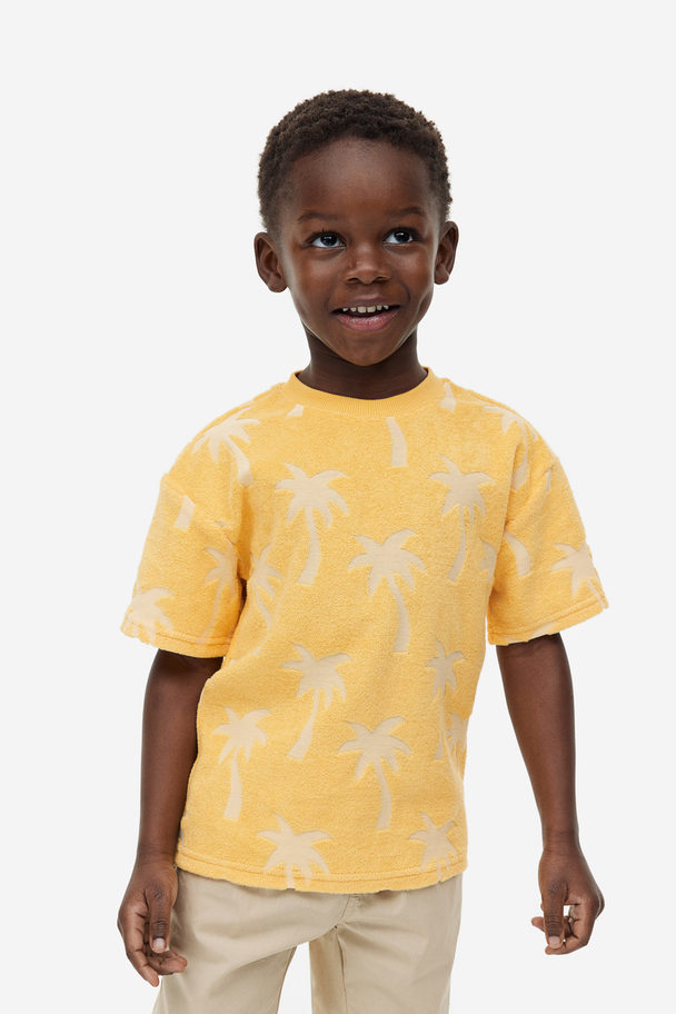 H&M Oversized Badstof T-shirt Geel/palmbomen