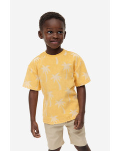Oversized T-Shirt aus Frottee Gelb/Palmen
