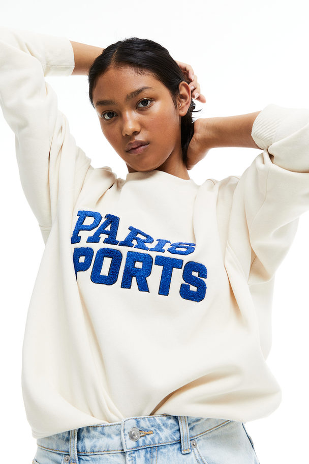 H&M Oversized Sweater Met Motief Roomwit/paris Sports