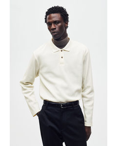 Poloshirt mit Waffelmuster in Slim Fit Cremefarben