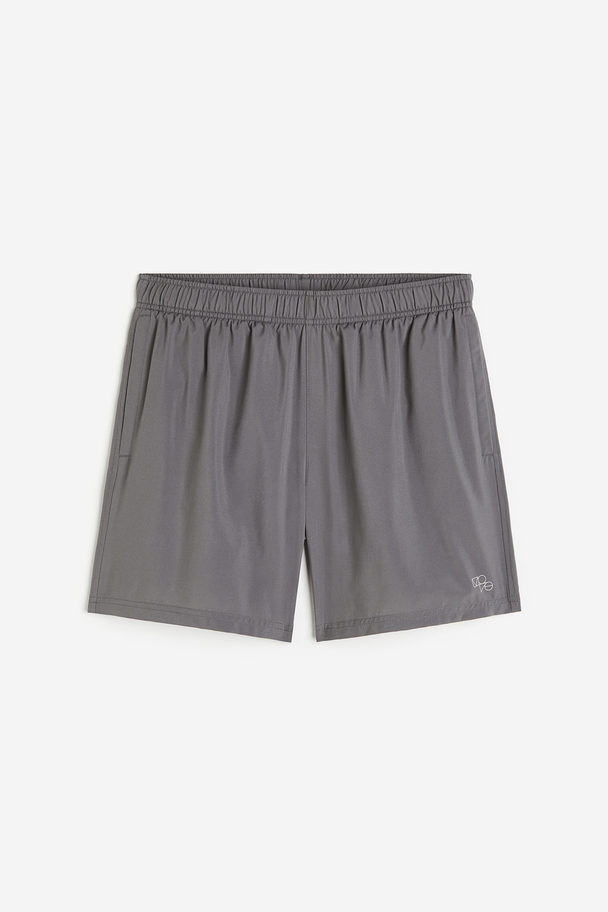 H&M Vävda Träningsshorts I Drymove™ Med Fickor Mörkgrå