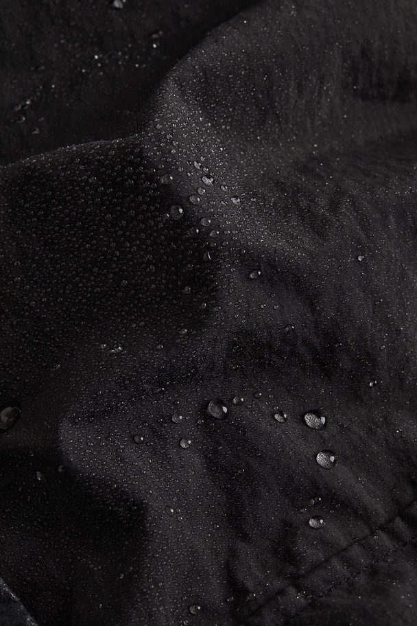 H&M Wasserabweisende, längenverstellbare Outdoorjacke Schwarz