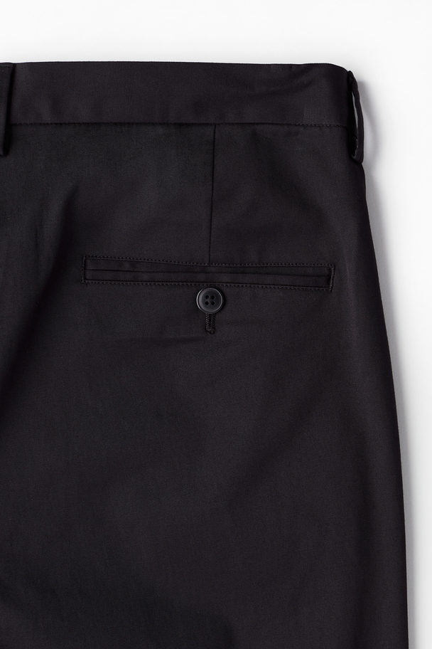 H&M Baumwollhose in Slim Fit Schwarz