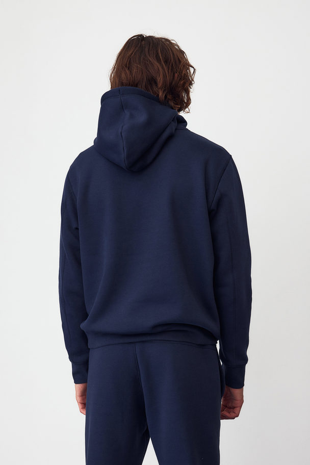 H&M DryMove™ Sport-Hoodie in Regular Fit Marineblau