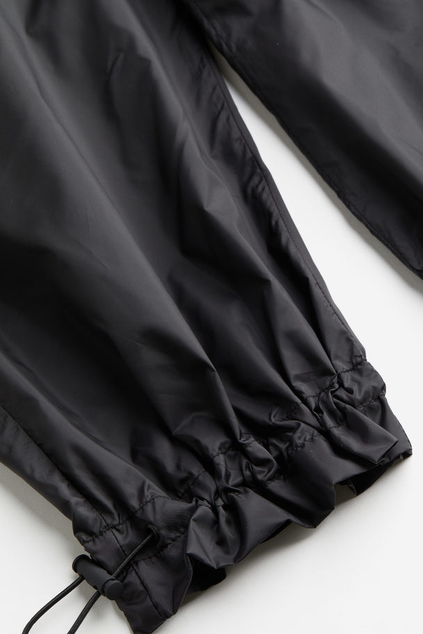 H&M Waterafstotende Parachutebroek Zwart