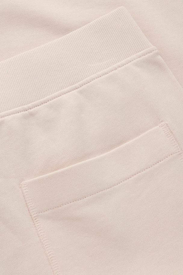 COS Tapered Joggers Cream