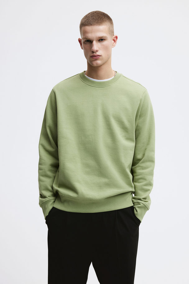 H&M Sweatshirt in Regular Fit Grün