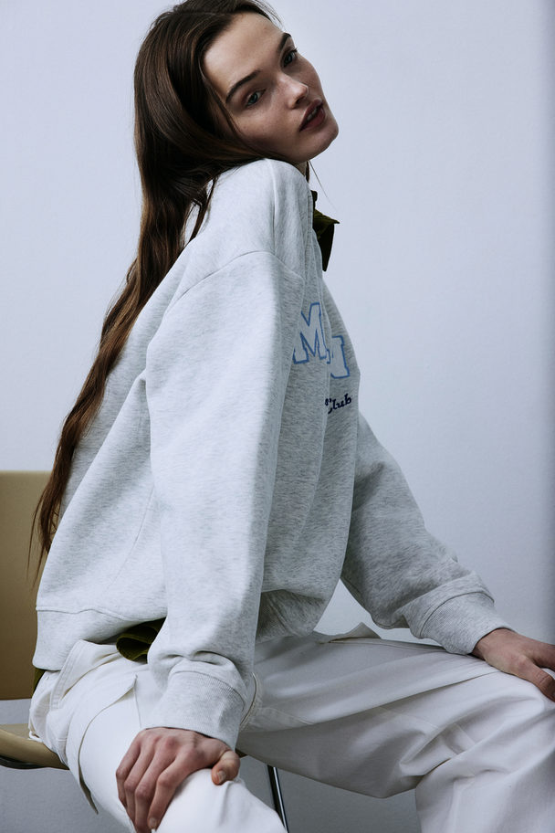 H&M Sweatshirt mit Print Hellgraumeliert/Milano