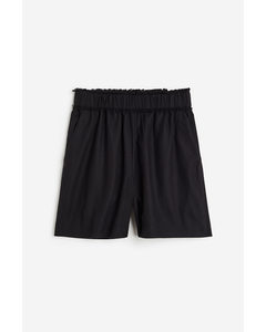 Seidenshorts mit Fransenkanten Schwarz