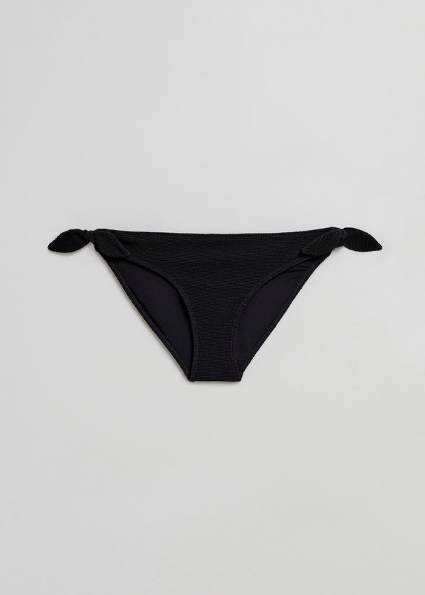 & Other Stories Krepp-Bikinihose mit Zierknoten Schwarz