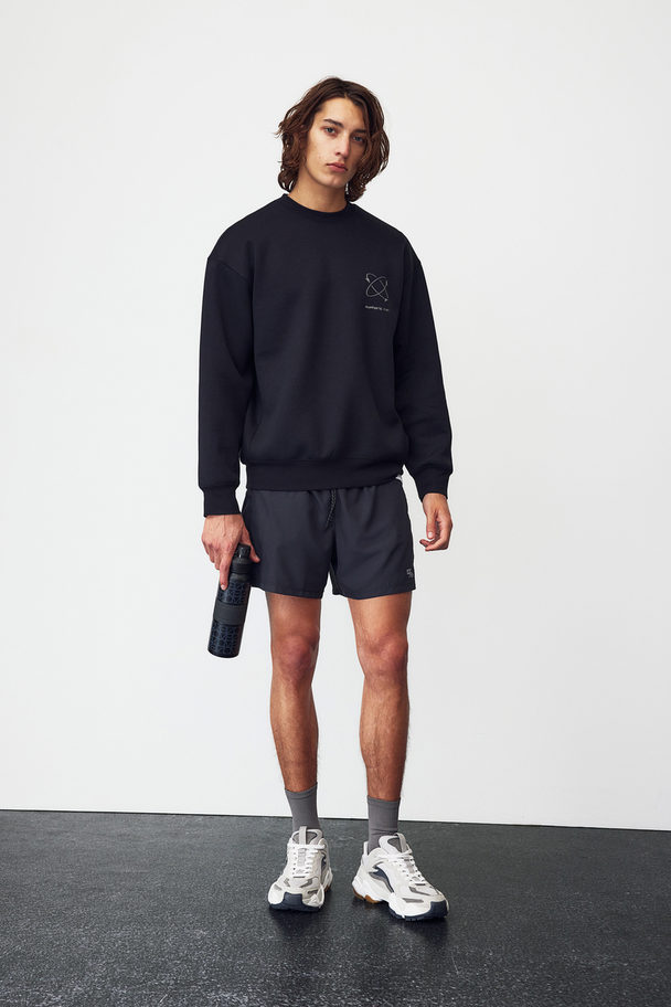 H&M DryMove™ Sport-Sweatshirt Schwarz/Euphoric Run