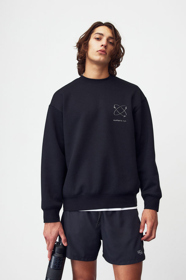 H&M DryMove™ Sport-Sweatshirt Schwarz/Euphoric Run