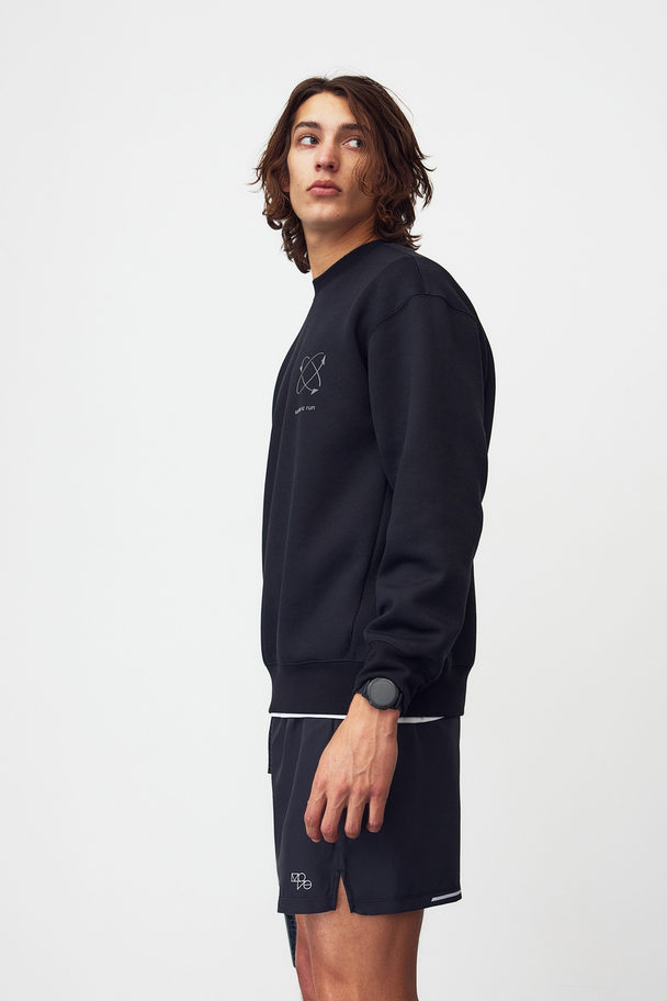 H&M DryMove™ Sport-Sweatshirt Schwarz/Euphoric Run